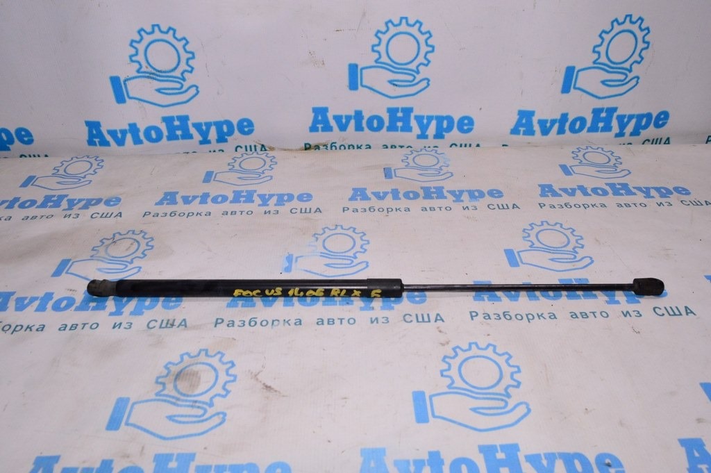 Амортизатор двери багажника левый Ford Focus mk3 11-18 5d