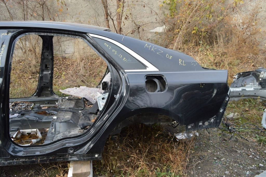 Четверть крыло задняя левая Lincoln MKZ 13- черный цвет UH (03) тычка