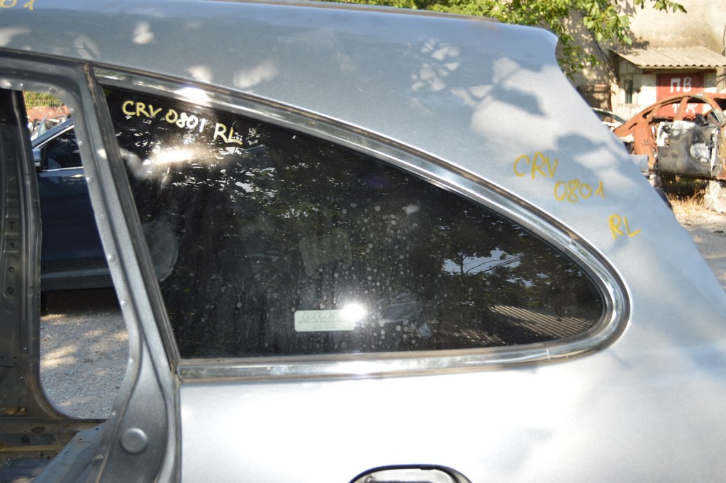 Форточка (глухое стекло) задняя левая Honda CRV 07-11