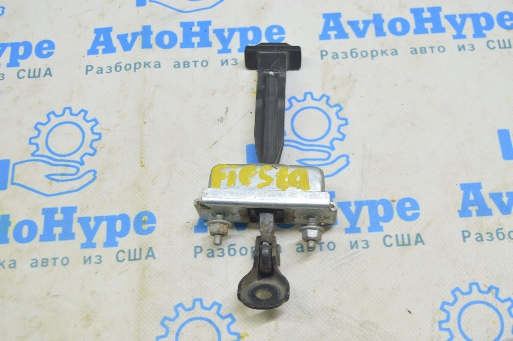 Ограничитель двери зад лев Ford Fiesta 11-19