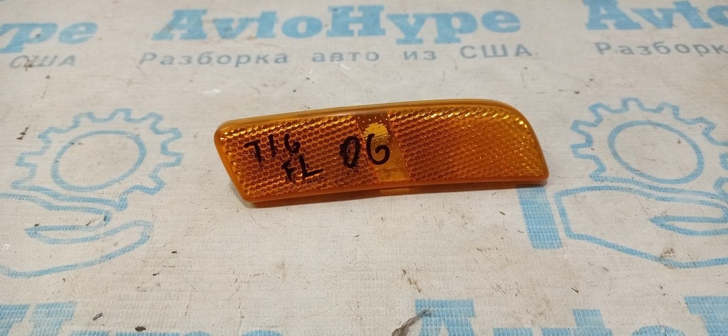 Отражатель переднего бампера лев VW Tiguan 09-17