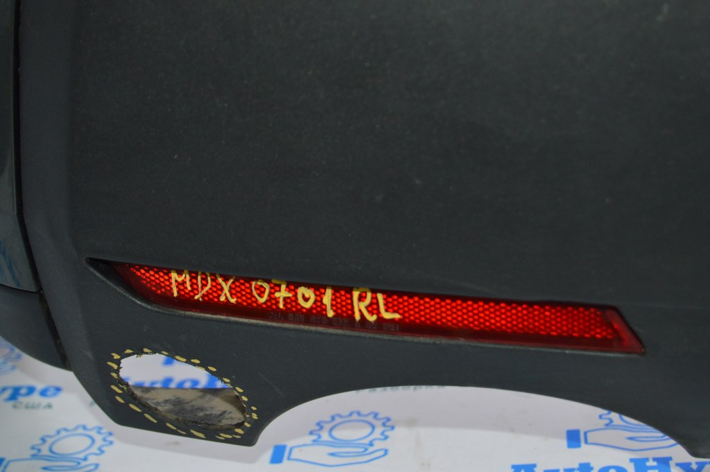 Отражатель зад лев Acura MDX 07-09