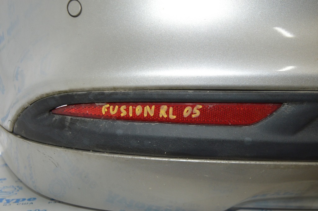 Отражатель заднего бампера лев Ford Fusion mk5 13-