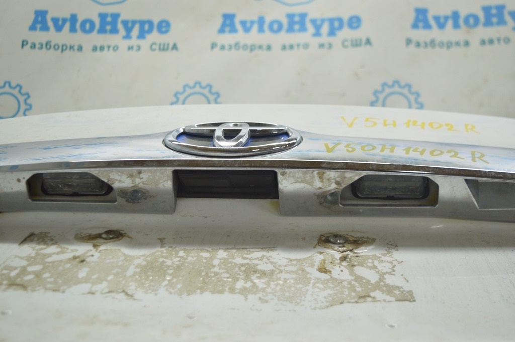 Подсветка номера лев  Toyota Camry v50 12-14