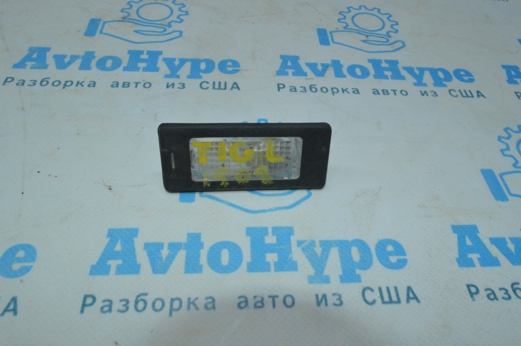Подсветка номера лев VW Tiguan 09-17
