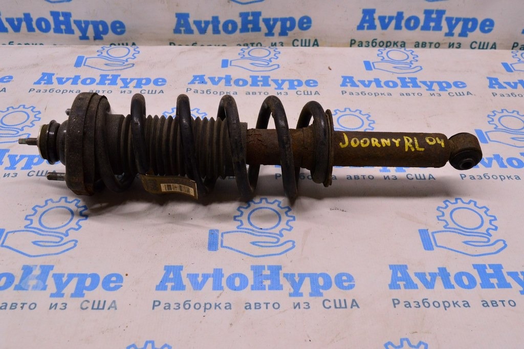 Стойка амортизатора в сборе зад лев Dodge Journey 11- (04)