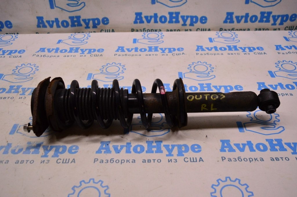 Стойка амортизатора в сборе зад лев Subaru Outback 15-19 (03) вмятинка