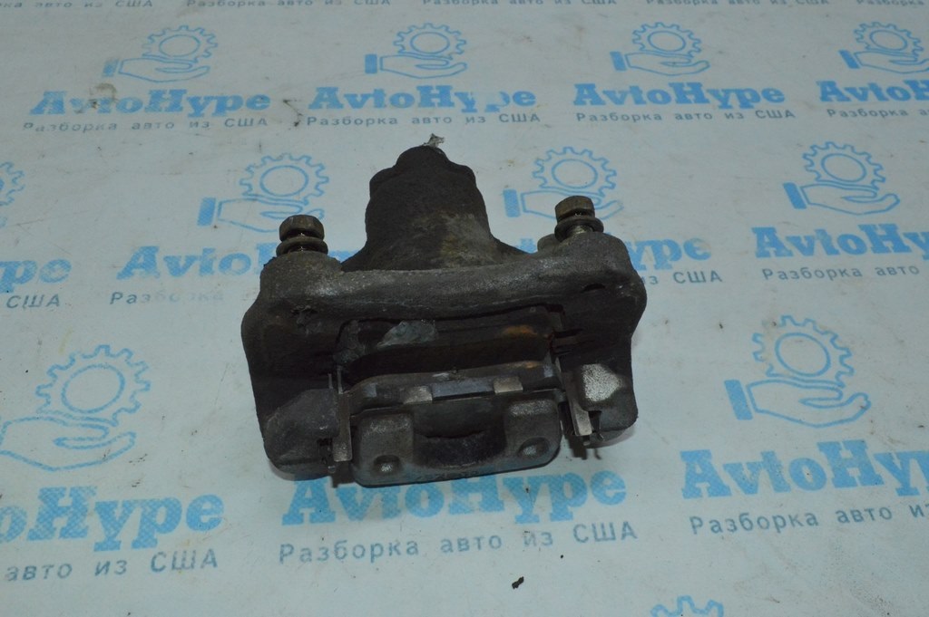 Суппорт зад лев Toyota Avalon 05-12