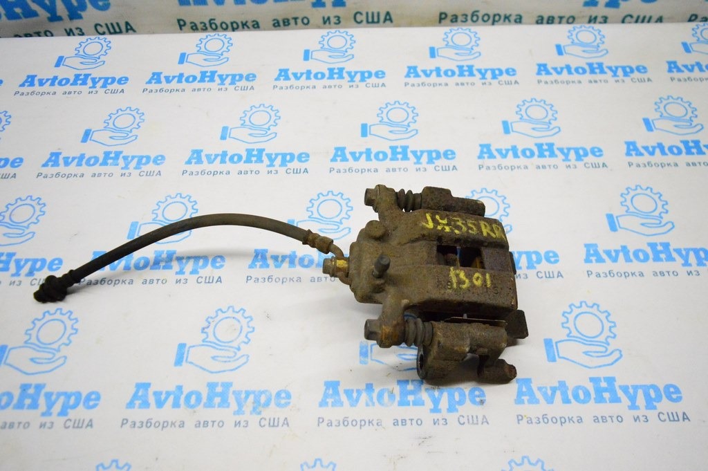 Суппорт зад прав Infiniti JX35 QX60 13- (01)