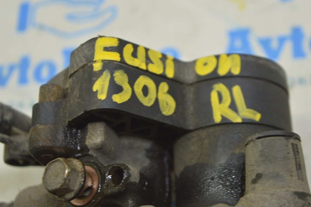 Суппорт задний левый Ford Fusion mk5 13- электро (06) с колодками 90% — фото 2