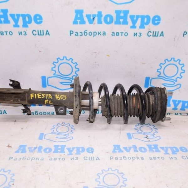 Стойка амортизатора в сборе перед лев Ford Fiesta 11-19 (03) D2BZ-18124-A