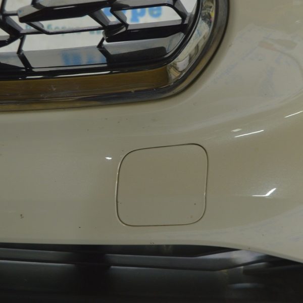 Заглушка буксир крюка переднего бампера левая Toyota Highlander 20- 52128-0E933