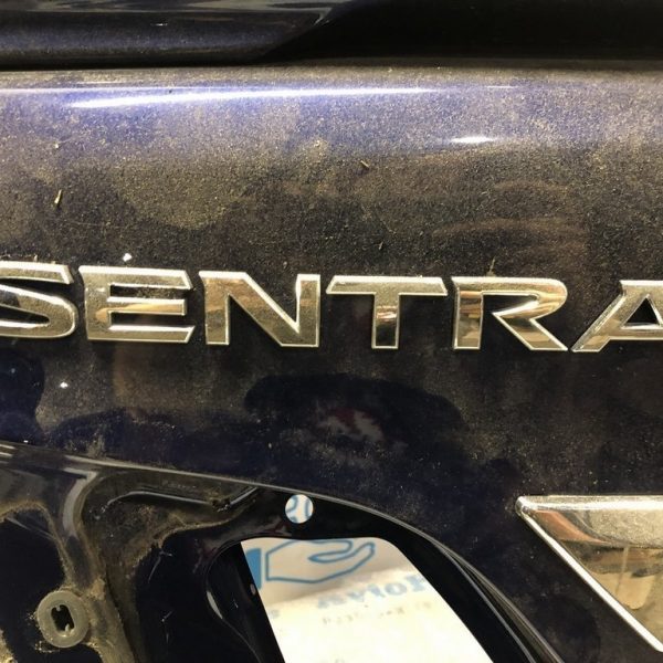 Эмблема надпись SENTRA крышки багажника Nissan Sentra 13-19 84890-3RA0A