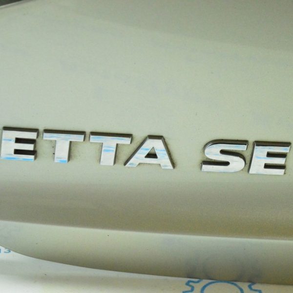 Эмблема надпись SE крышки багажника VW Jetta 11-18 USA 5C6853675BA