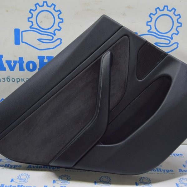 Обшивка двери карточка задн лев Tesla Model 3 18-20 кожа чёрн, вставк тряпка,с кнопк (03) деф 109041301L