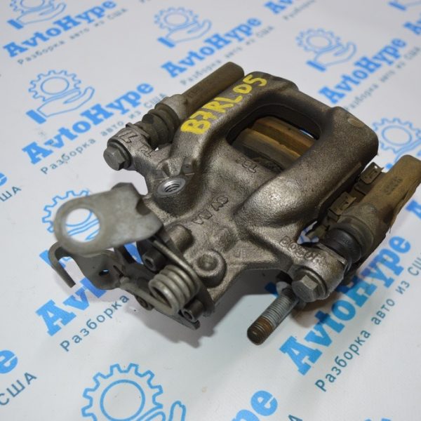 Суппорт зад лев VW Passat b7 USA 5K0-615-423