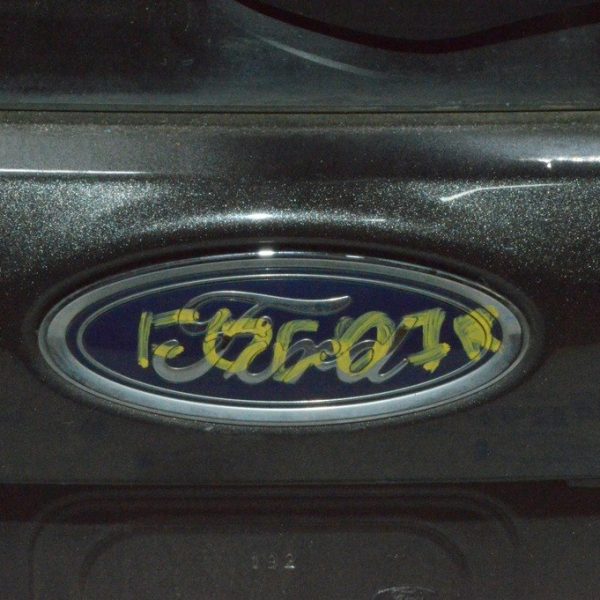 Эмблема значок двери багажника Ford Focus mk3 15-18 рест 5d F1EZ-9942528-F