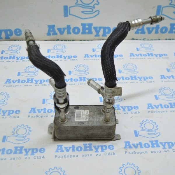 Масляный охладитель КПП Ford Fusion mk5 13- DG9Z-7A095-A DG9Z-7A095-A