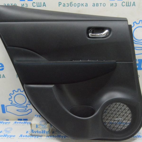 Обшивка двери карточка задн лев Nissan Leaf 18-21 черн с вставк кожа,подлокотн тряпка BOSE 822233NF0A
