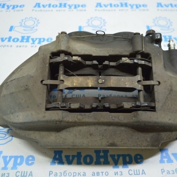 Суппорт перед лев Lexus LS460 LS600h 07-12 4 поршня 47750-50200