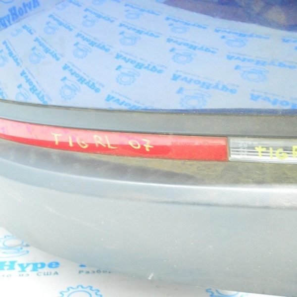 Отражатель заднего бампера лев VW Tiguan 09-17 (деф) 3 усика обломано 5N0945105