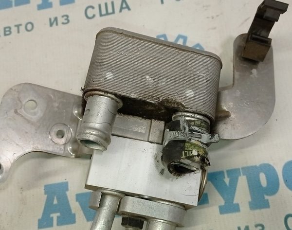 Теплообменник масло Chevrolet Volt 16- с клапаном системы охлаждения гибрида 23298104